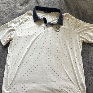 Barstool Golf x UNRL Polo Shirt with Navy Collar and Micro Dot Pattern